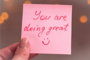 post it with "you are doing great" written on it