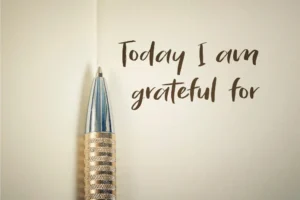 an image of a pen nexrt to the words "today i am grateful for"