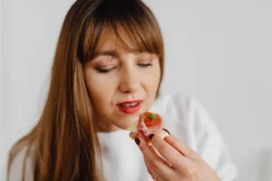 a woman savouring a canape
